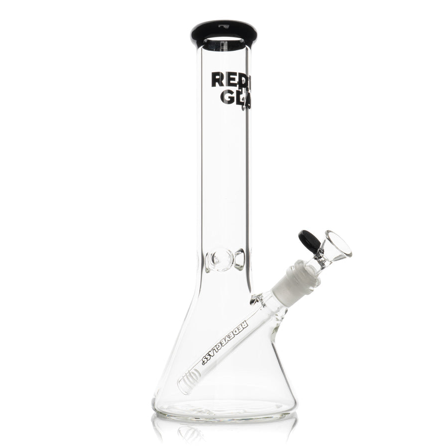 Clear glass beaker bong with a slanted joint, black mouthpiece, and Red Eye Glass logo.